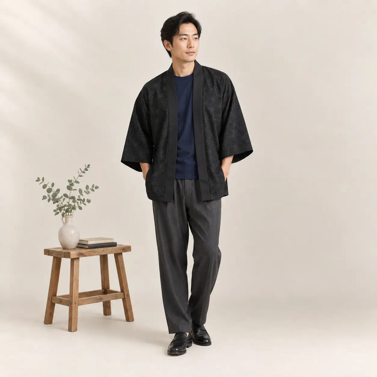Black textured kimono jacket haori with three-quarter sleeves and relaxed fit for stylish layering and comfort Image