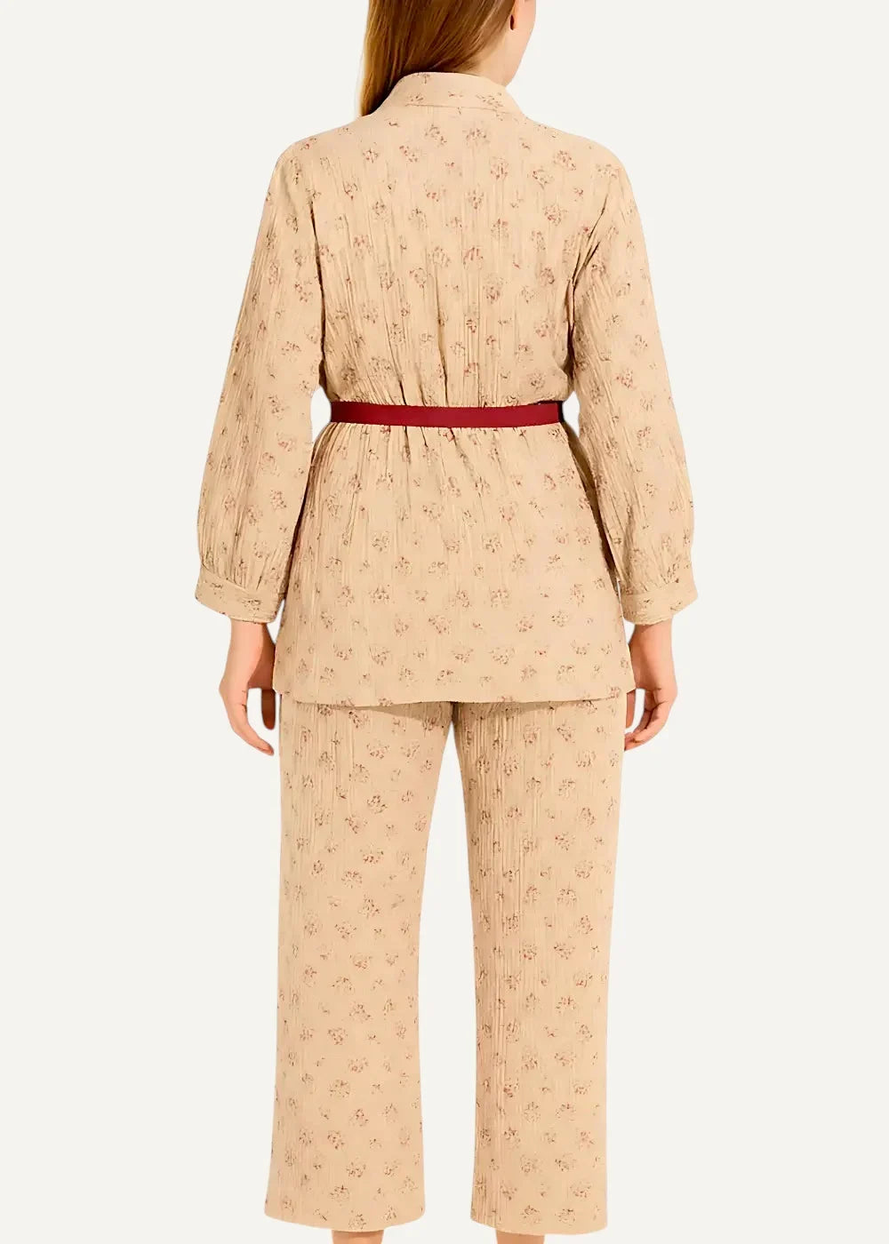 Beige cotton kimono pajamas with subtle floral pattern ribbed texture and contrasting red belt for comfortable wear