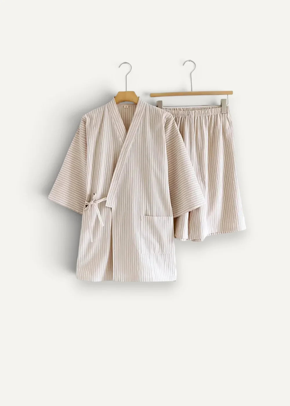 Beige striped kimono pajamas featuring a cotton top with vertical stripes and matching shorts set
