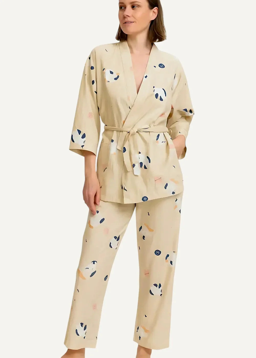 Beige women’s kimono pajamas with playful panda print fabric and matching belt for comfortable loungewear
