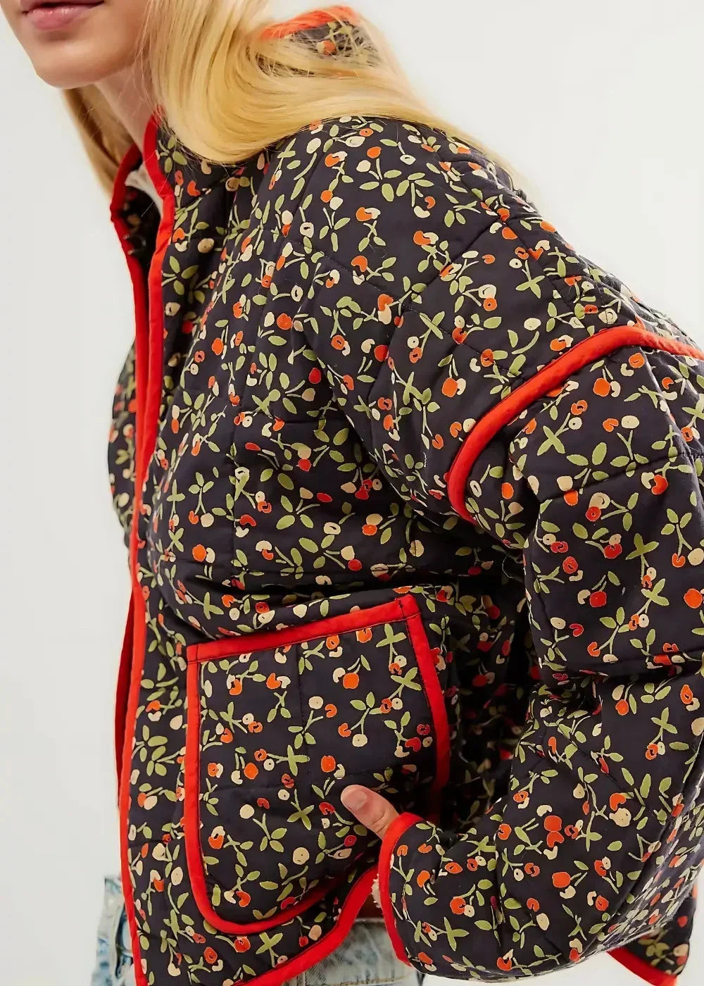 Black floral kimono jacket in dark navy quilted fabric with cherry leaf pattern and bold red trim along edges