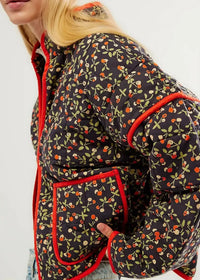 Black floral kimono jacket in dark navy quilted fabric with cherry leaf pattern and bold red trim along edges