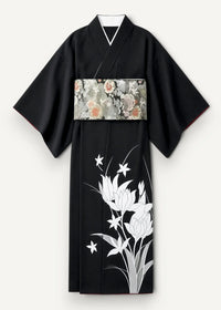 Black floral kimono made of black silk with white floral embroidery and a patterned obi belt