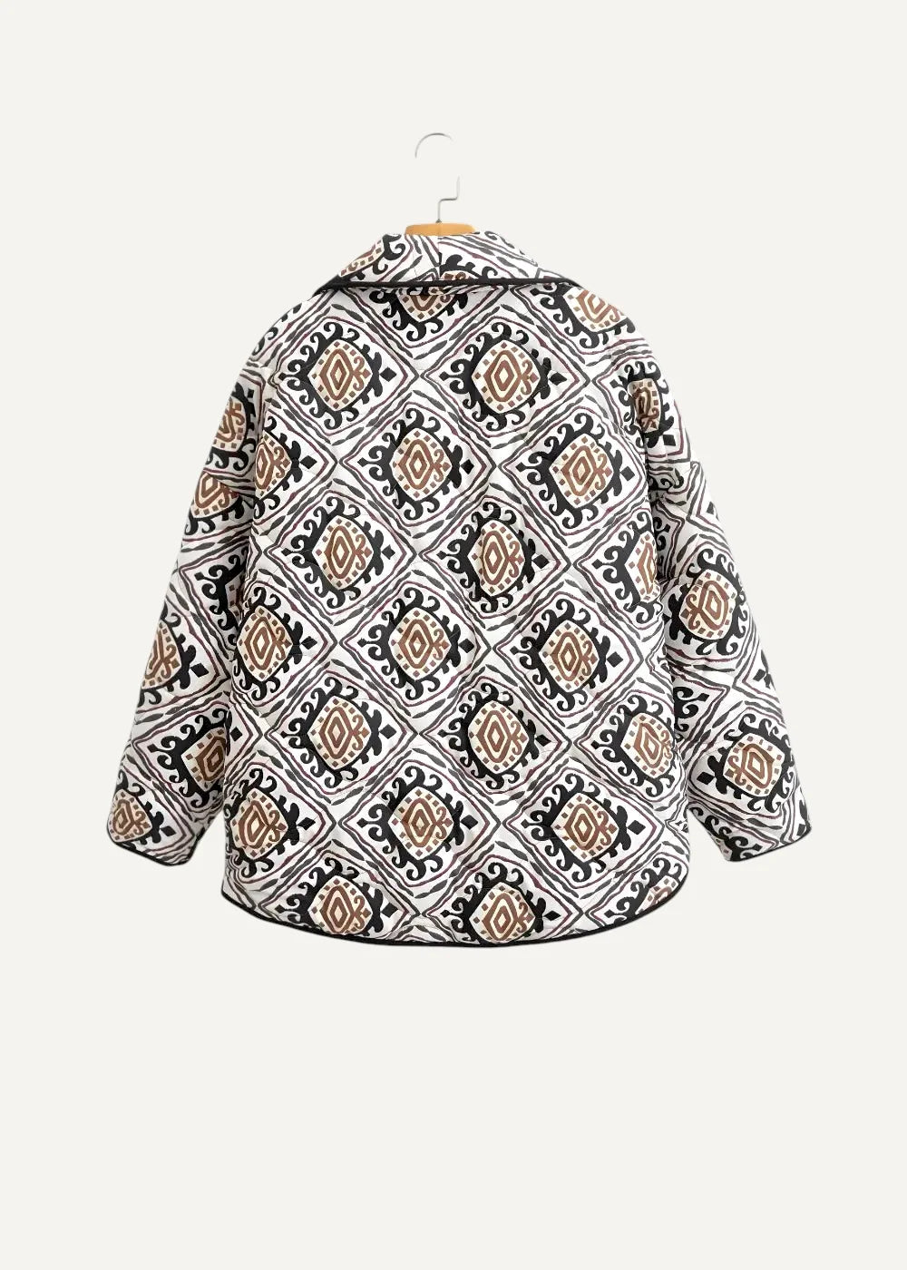 Black haori cozy long-sleeved jacket with bold black white and beige geometric diamond pattern and ornate detailing