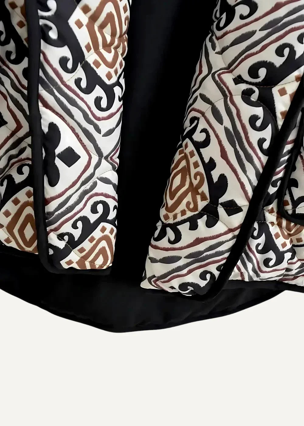 Quilted black haori jacket with bold geometric pattern in black brown and cream tones