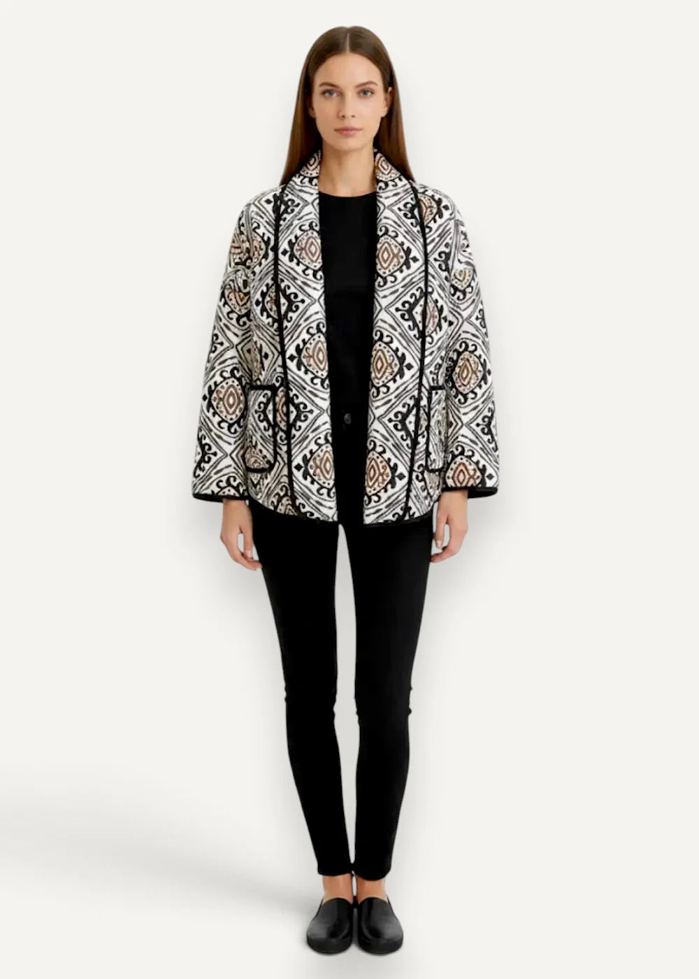 Black haori quilted jacket with black and white patterns and beige geometric accents