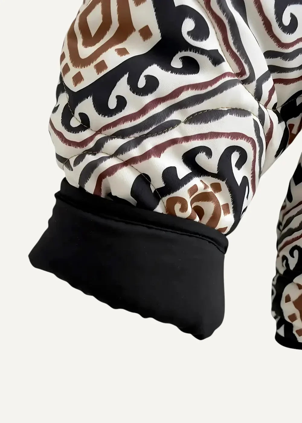 White quilted pants with black and brown tribal patterns and soft black elastic cuff from black haori collection