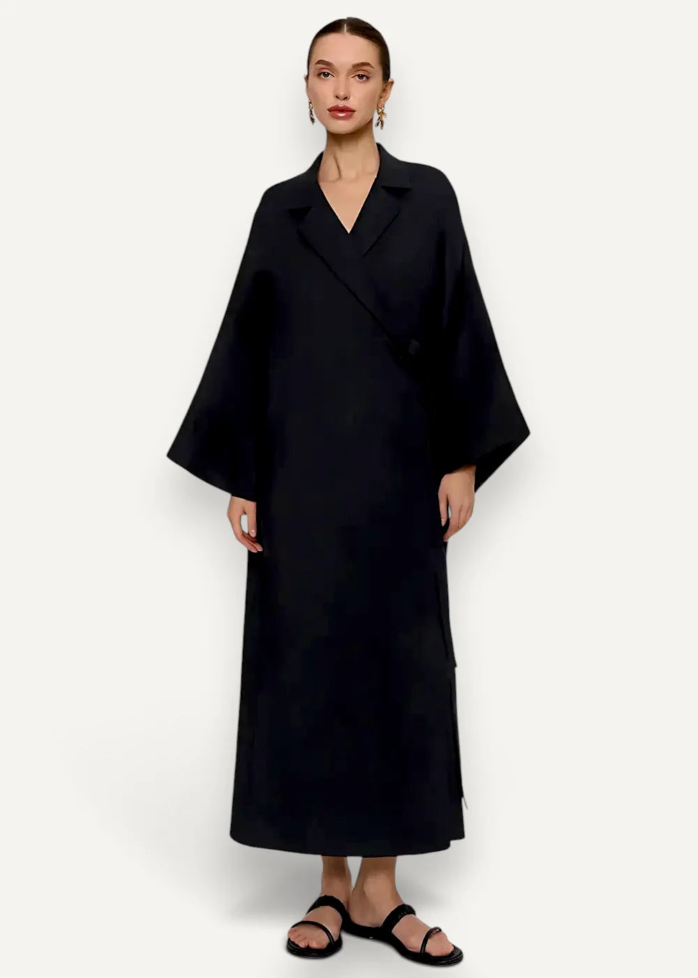Black kimono dress long featuring a minimalist wrap coat design with wide sleeves and a sleek silhouette