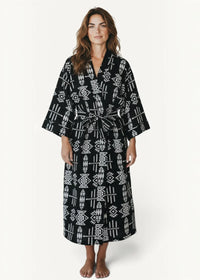 Black kimono dress with black and white geometric pattern and belted waist in lightweight fabric