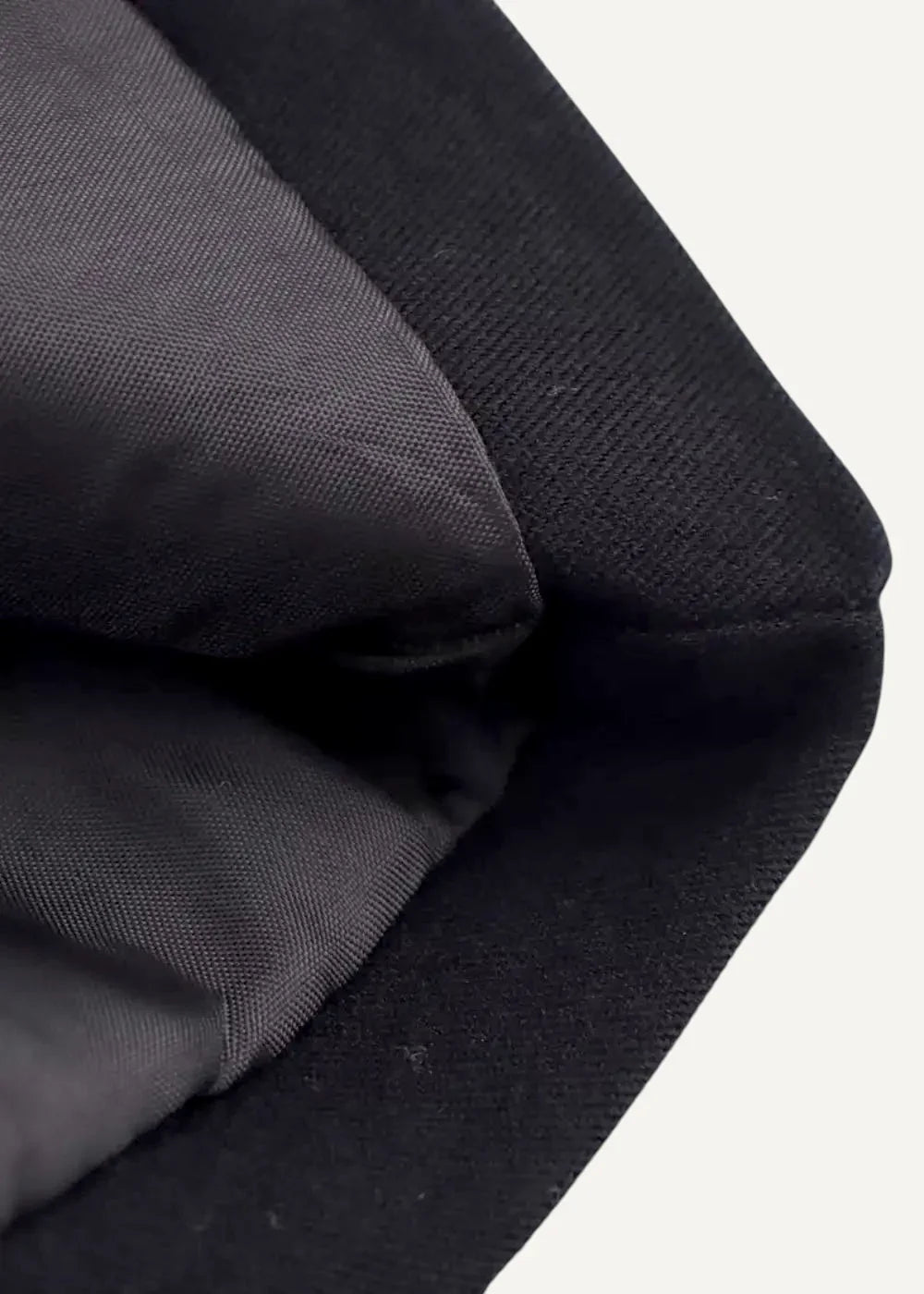 Black kimono jacket made of quilted fabric with a smooth slightly textured black surface