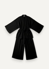 Black kimono pajamas made of soft fabric with wide sleeves and matching belt for comfortable loungewear