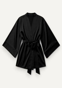 Black satin robe with wide sleeves and a tied waistband made from smooth satin fabric for elegant loungewear