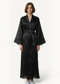 Black silk robe women’s with delicate lace trim at cuffs and hem in smooth satin fabric