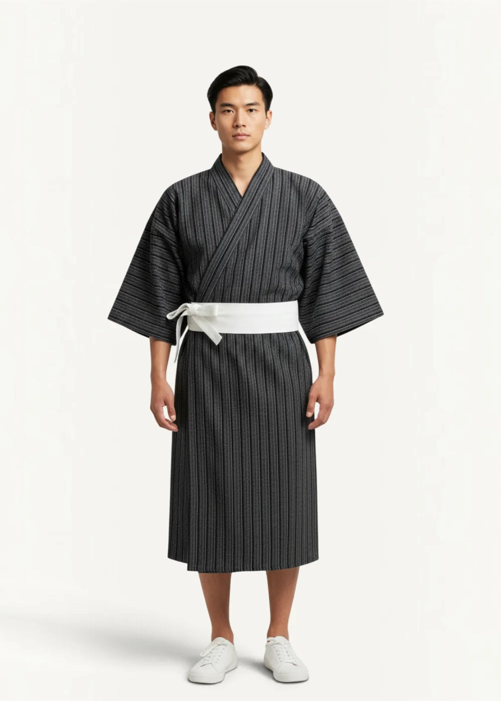 A dark gray striped black yukata with a white obi belt showcasing traditional japanese summer kimono style