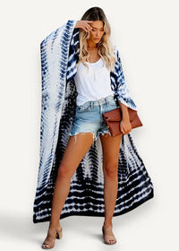 Blue and white kimono style coat with a long flowing tie dye pattern and loose fit