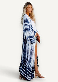 Blue and white kimono flowing tie-dye maxi dress with v-neckline long sleeves and high side slit