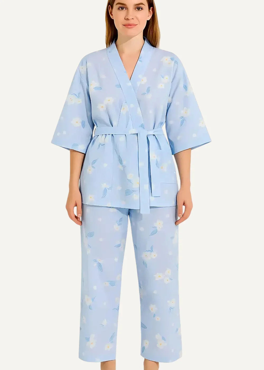 Light blue floral kimono pajama set with matching belt and wide-leg pants made from soft fabric for comfortable loungewear