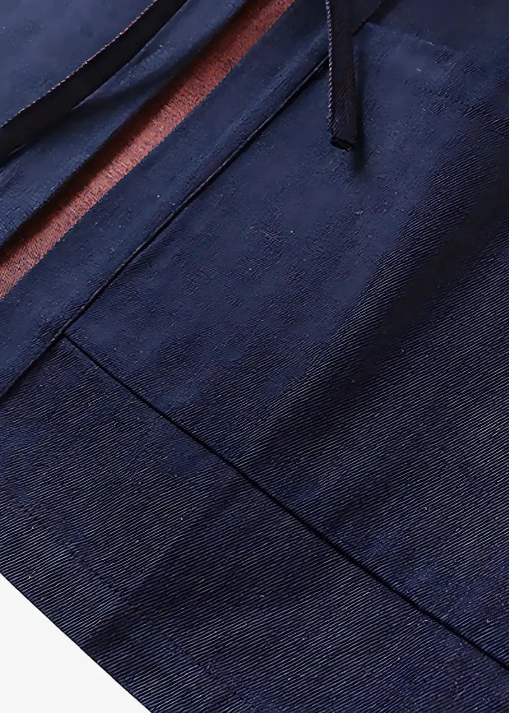 Blue haori made of dark blue denim fabric with subtle textured weave and rust-colored inner lining