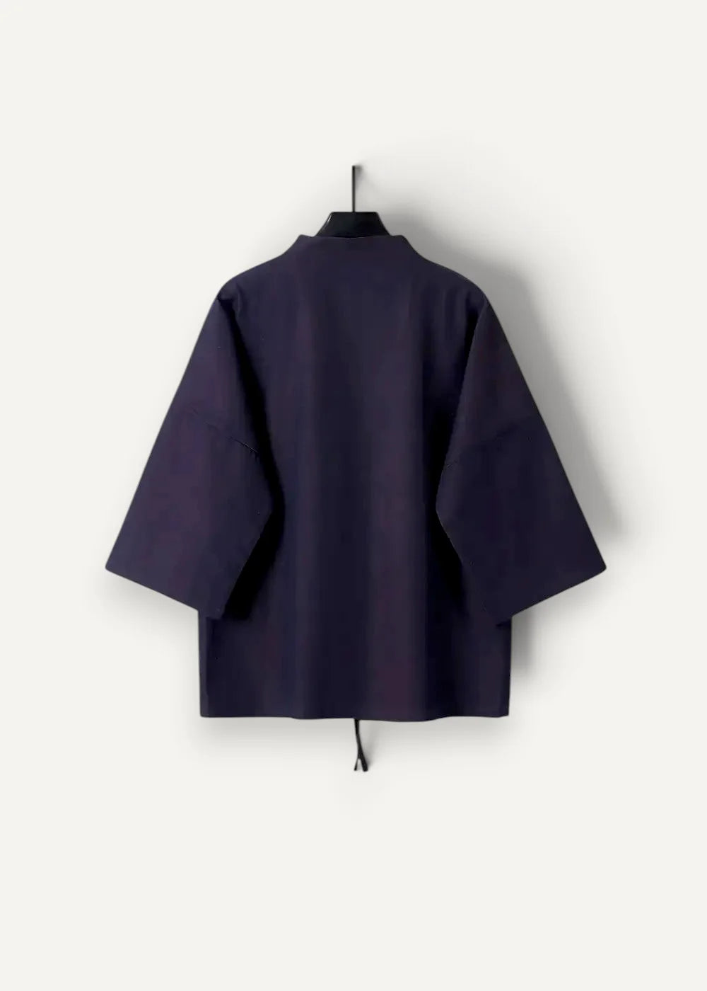 Blue haori dark navy minimalist kimono-style jacket with wide sleeves and drawstring hem visible from the back