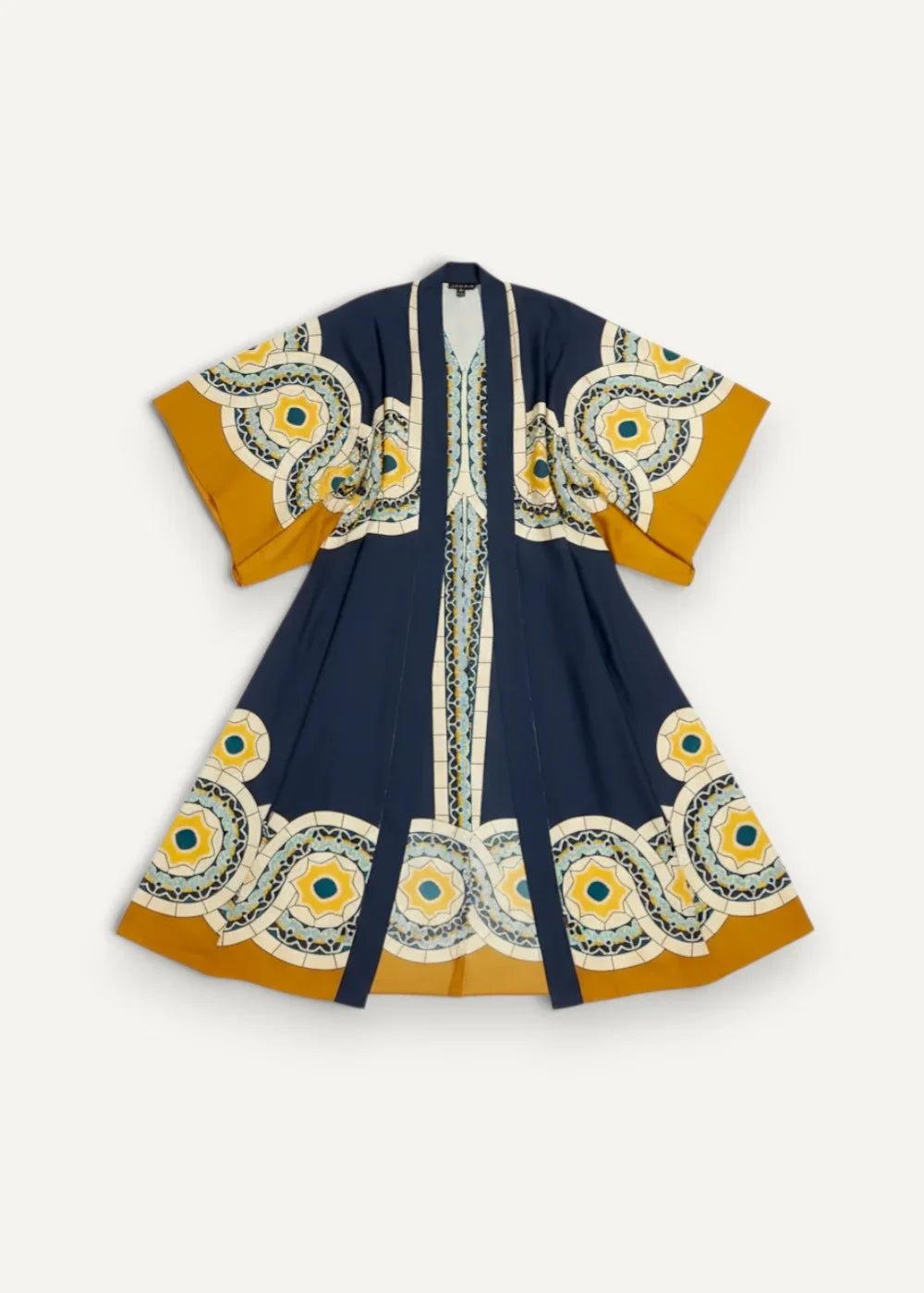 Blue Japanese kimono dress with navy blue fabric and mustard yellow white teal circular patterns on sleeves hem and front panel