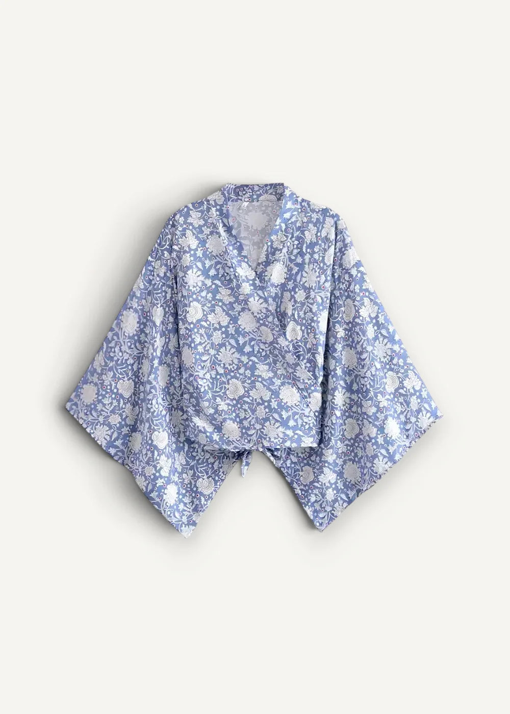 Blue kimono cardigan with light blue and white floral pattern and wide sleeves in lightweight fabric