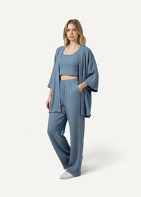 Blue short kimono pajamas featuring a soft muted blue loungewear set with flowing jacket and wide-leg pants