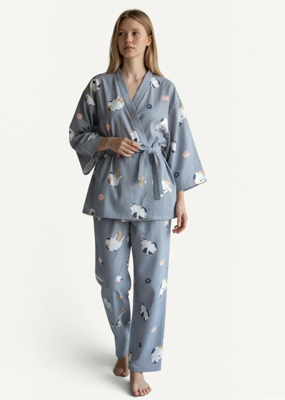 Blue women’s kimono pajamas featuring a gray wrap-style top with soft fabric and playful white and black cat pattern
