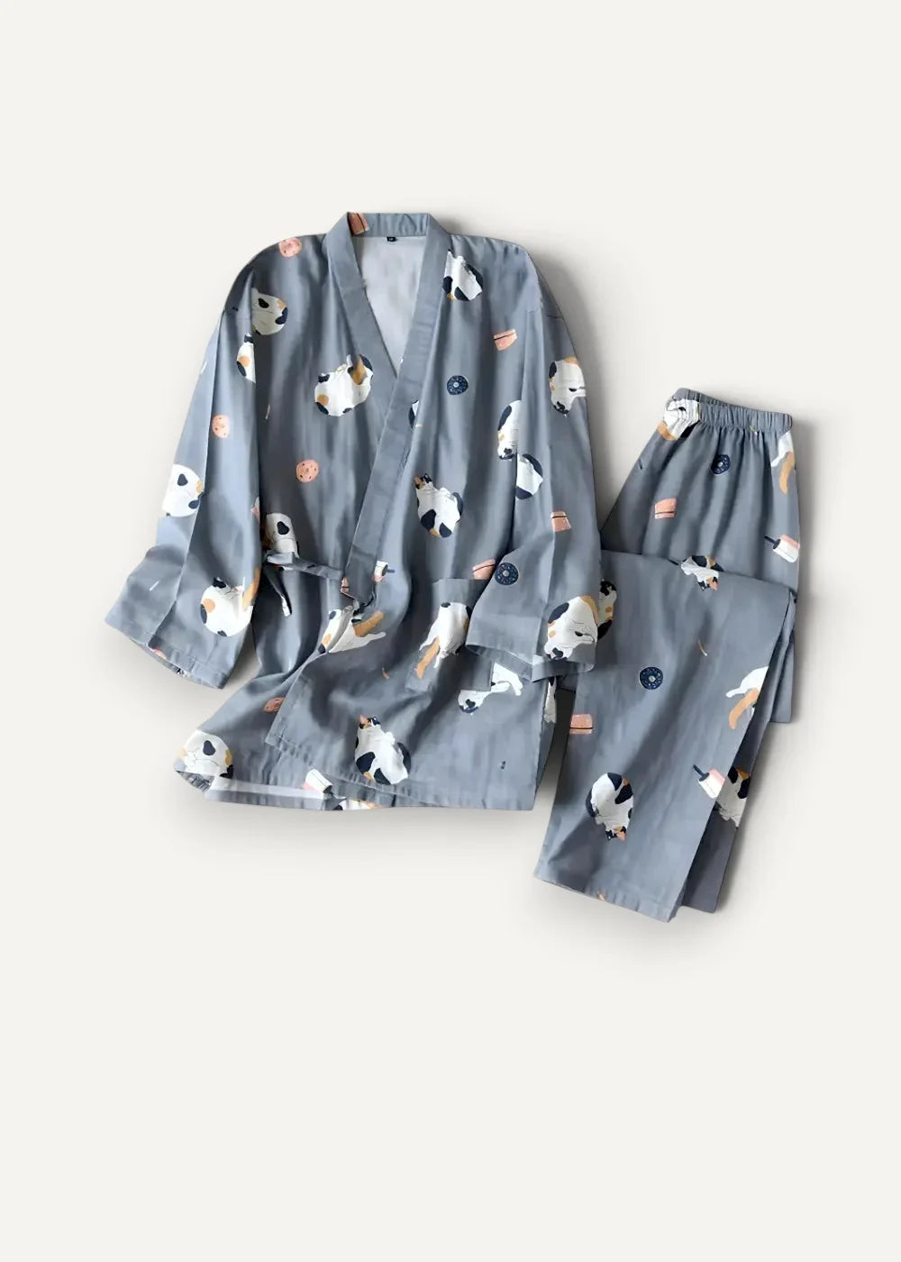 Blue women’s kimono pajamas with gray fabric featuring playful white and black sheep pattern orange circles and blue buttons