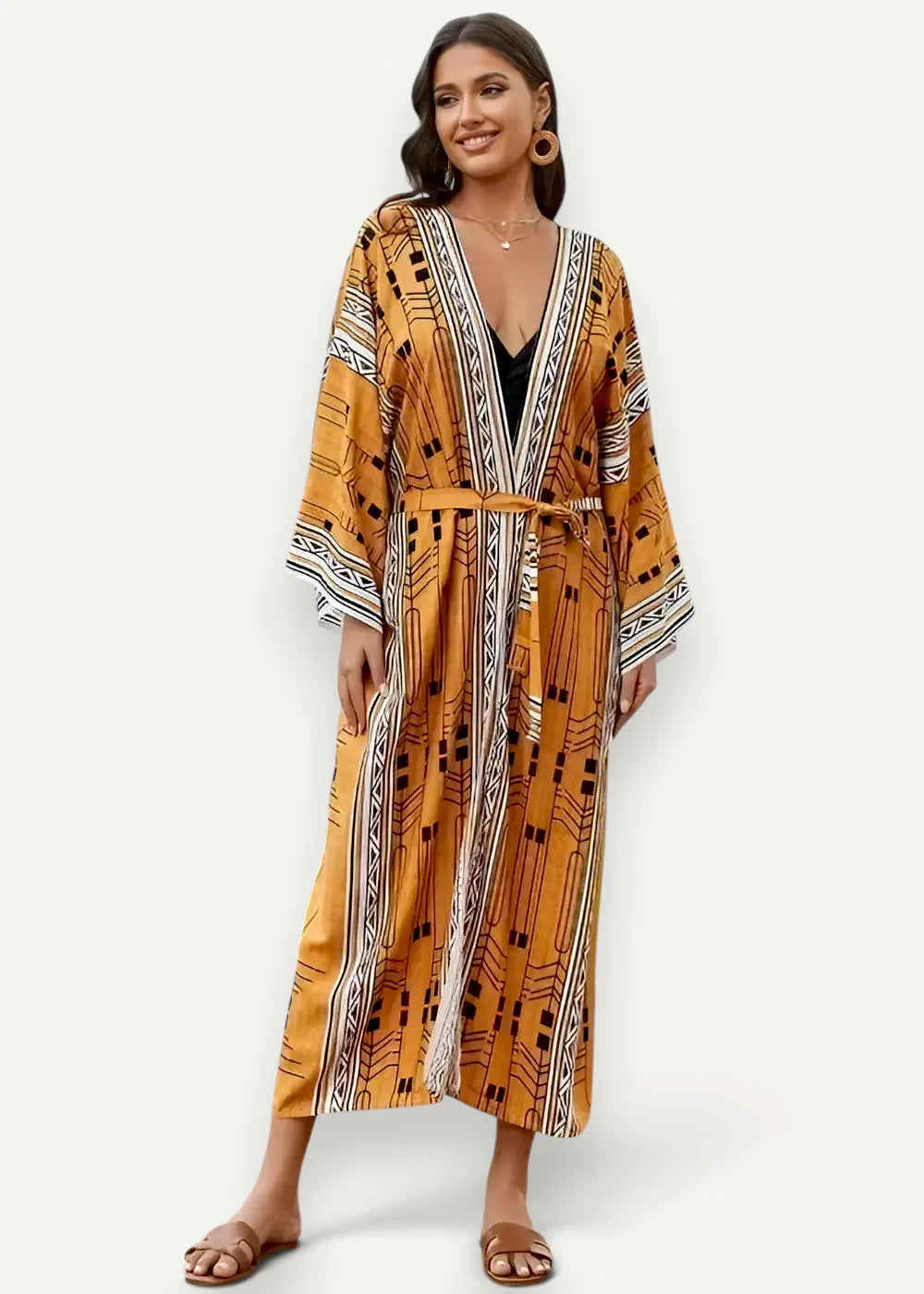 Boho kimono beach cover up in flowing mustard yellow with bold black and white geometric patterns and belted waist