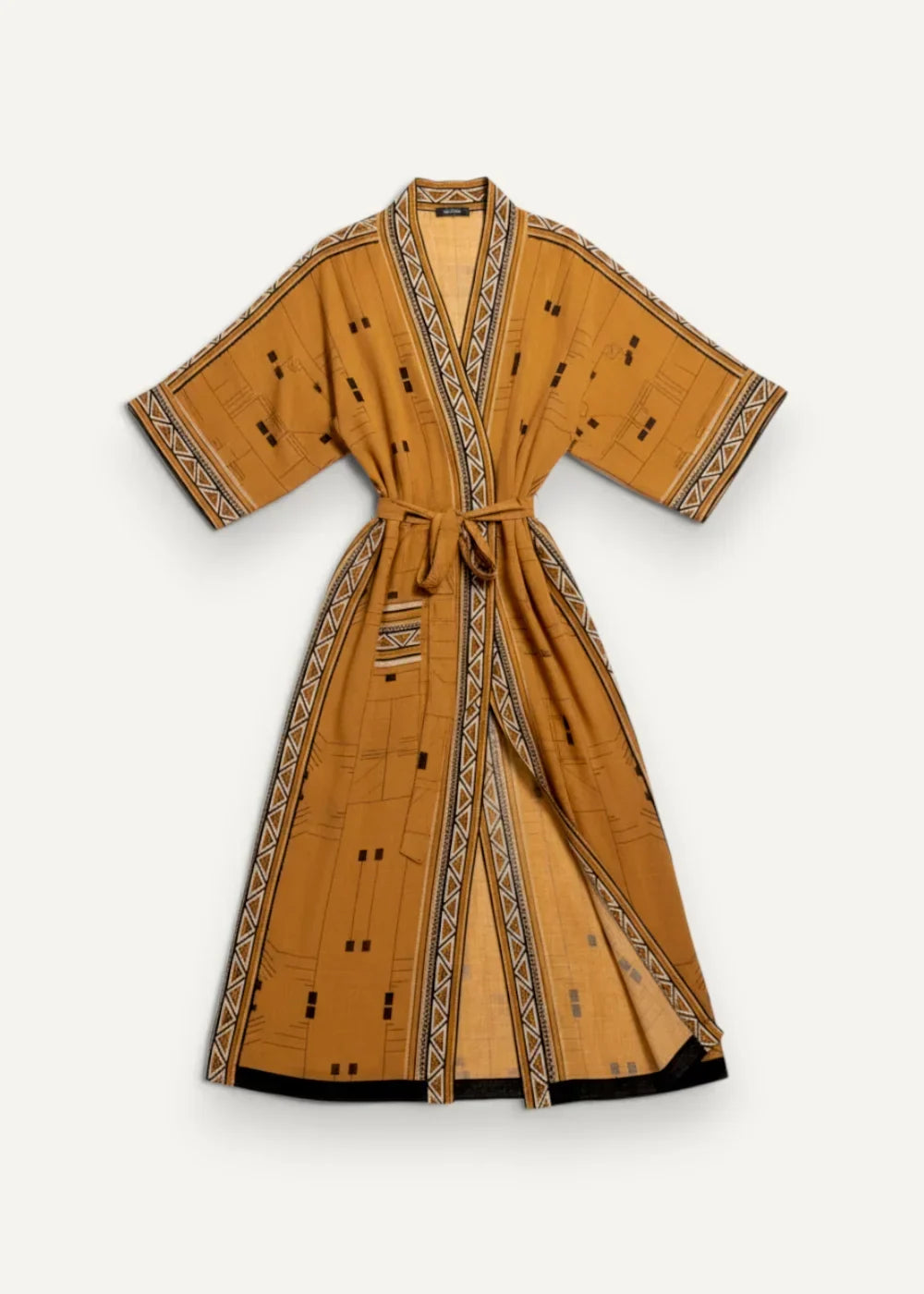 Boho kimono dress in mustard yellow with geometric and dot patterns and black trim on edges and sleeves