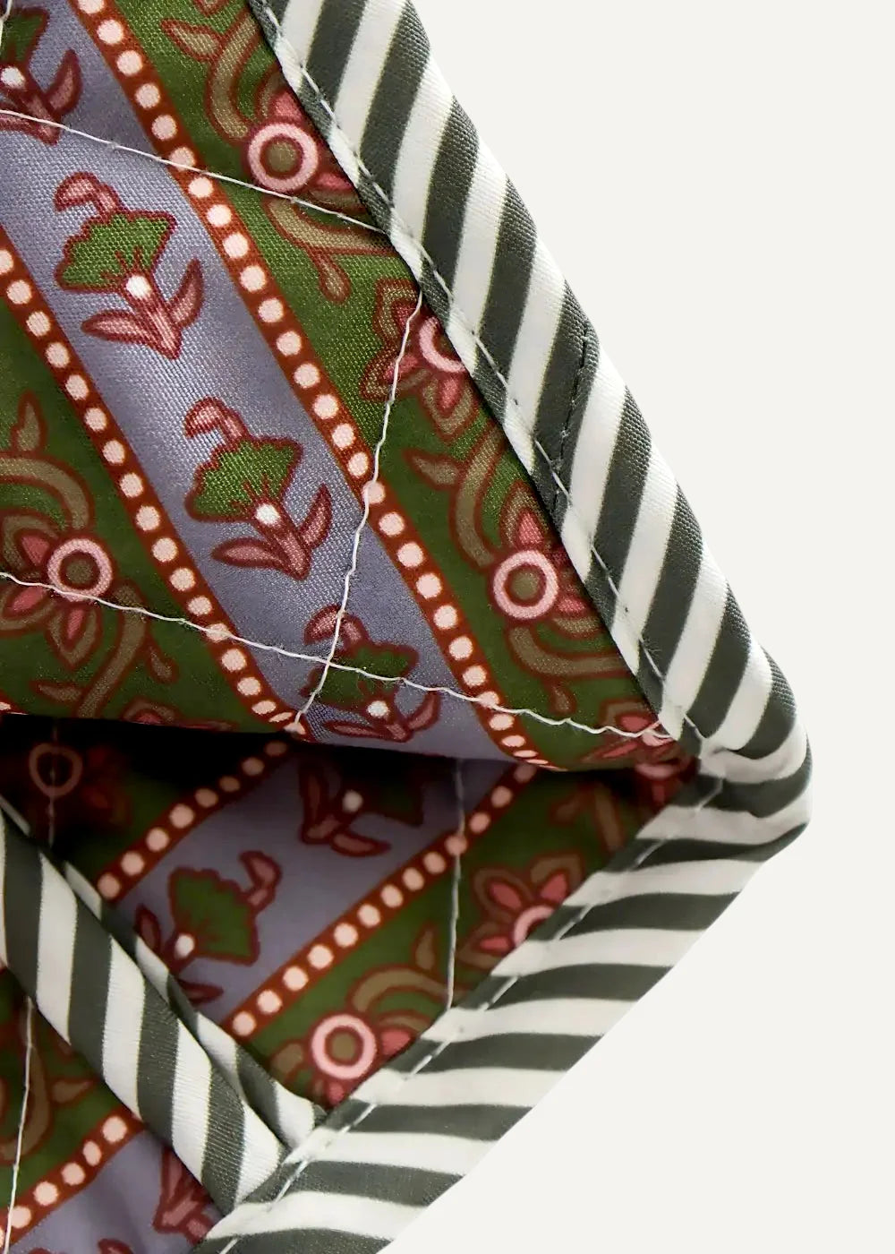 Quilted pocket square with green and purple floral pattern pink accents and black and white striped border for boho kimono jacket