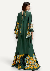 A flowing emerald green boho kimono maxi dress with gold black teal floral paisley patterns bell sleeves and back tie detail