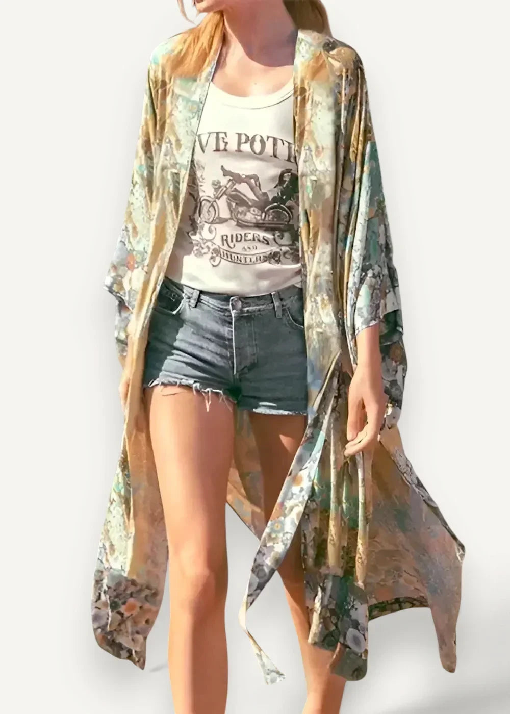 Boho style kimono cardigan in a flowing long-sleeved design with muted green and gold floral patterns