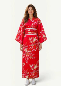 A vibrant red cherry blossom kimono with delicate pink white and gold floral patterns and three white sash stripes