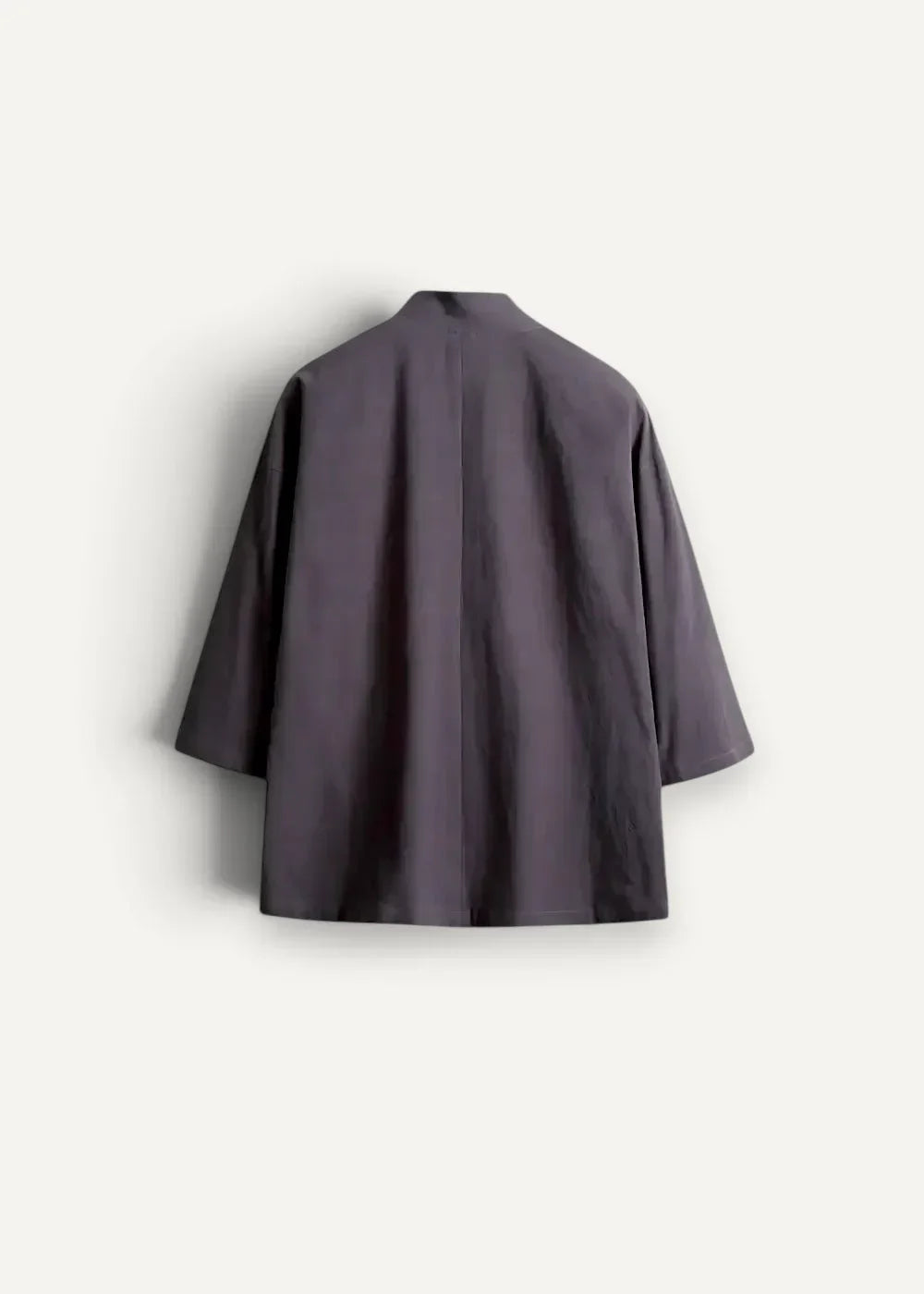 Dark gray minimalist cotton haori jacket with relaxed fit and three quarter sleeves shown from the back side