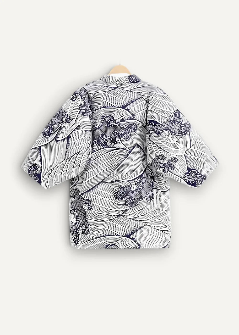 Cotton kimono jacket in white and navy blue with wave pattern and intricate black line detailing seen from the back