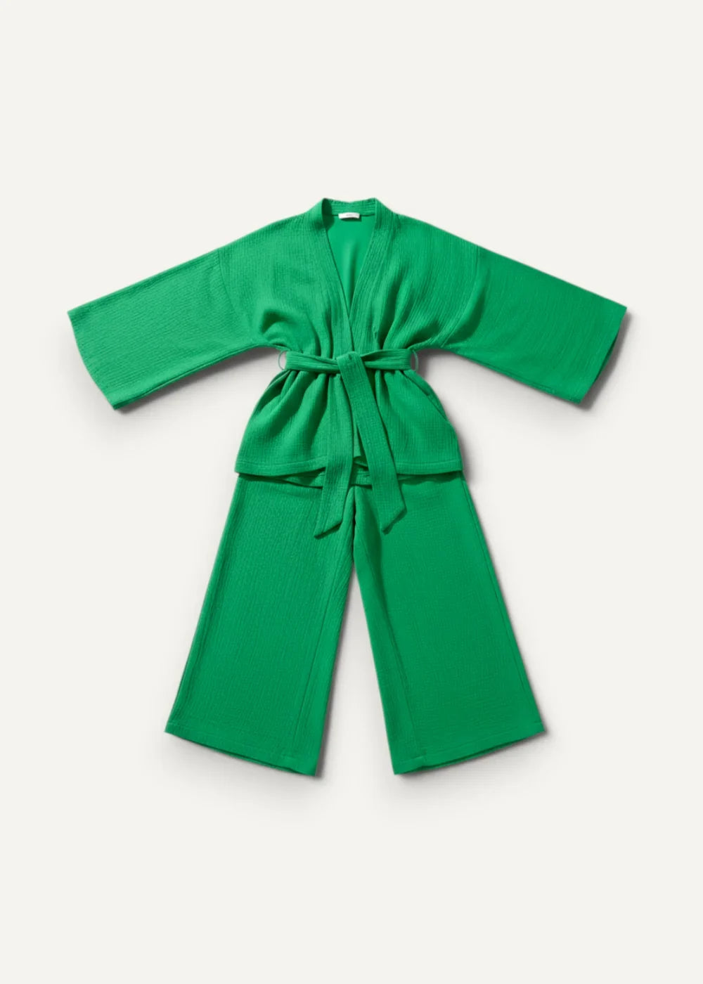 Vibrant emerald green cotton women’s kimono pajamas with wide sleeves and matching wide-leg pants tied at the waist