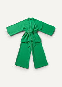 Vibrant emerald green cotton women’s kimono pajamas with wide sleeves and matching wide-leg pants tied at the waist