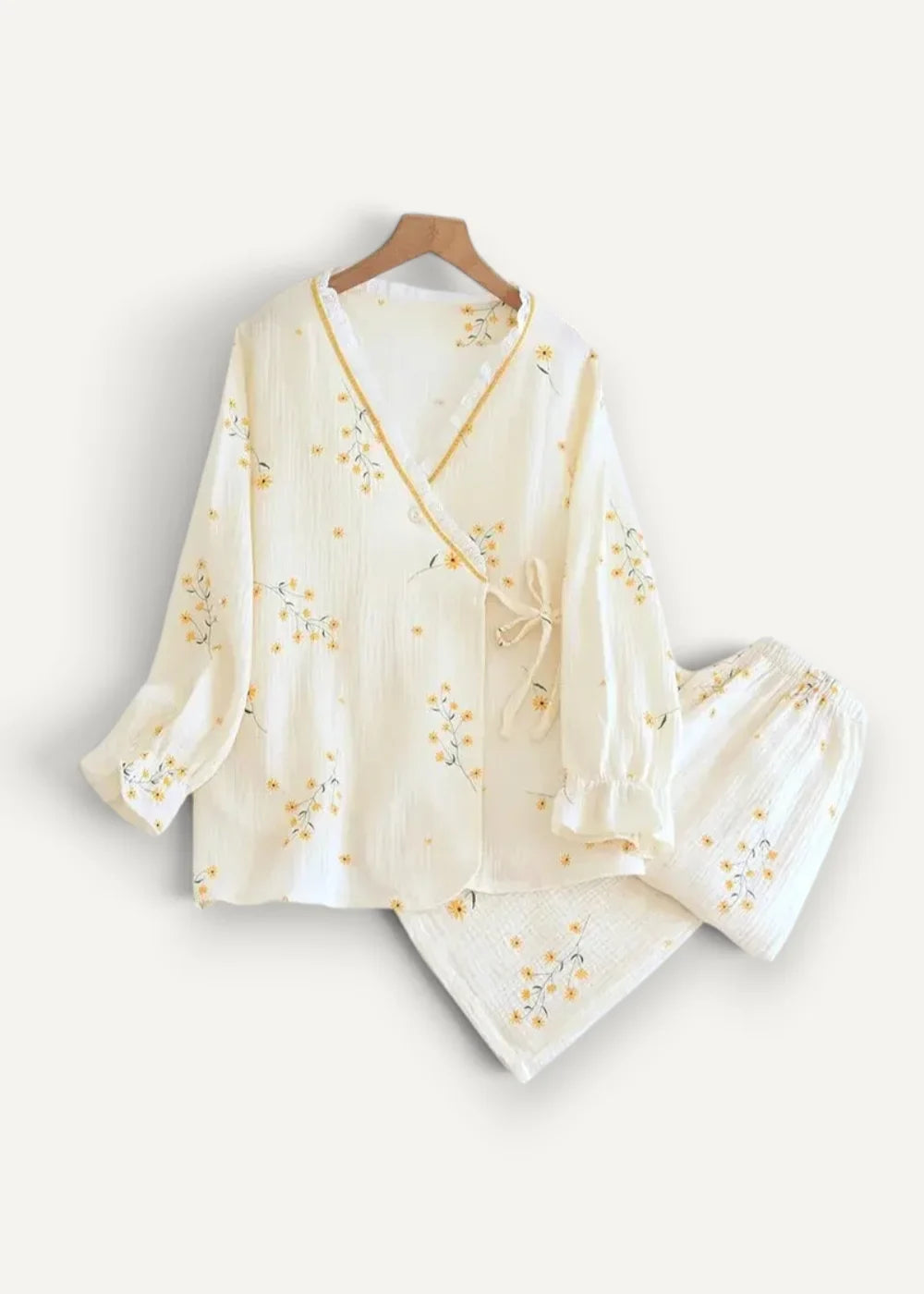 Cream kimono pajamas cream colored with delicate yellow floral embroidery and soft flowing fabric for comfortable wear