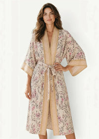 Cream kimono soft beige floral robe with pink and green blossoms, matching belt, and gold-toned trim along edges