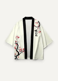 Cropped white kimono jacket with black trim and pink cherry blossom embroidery featuring japanese characters on sleeve