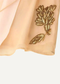 A floral embroidered kimono jacket in peach sheer fabric with intricate gold beaded floral embroidery design