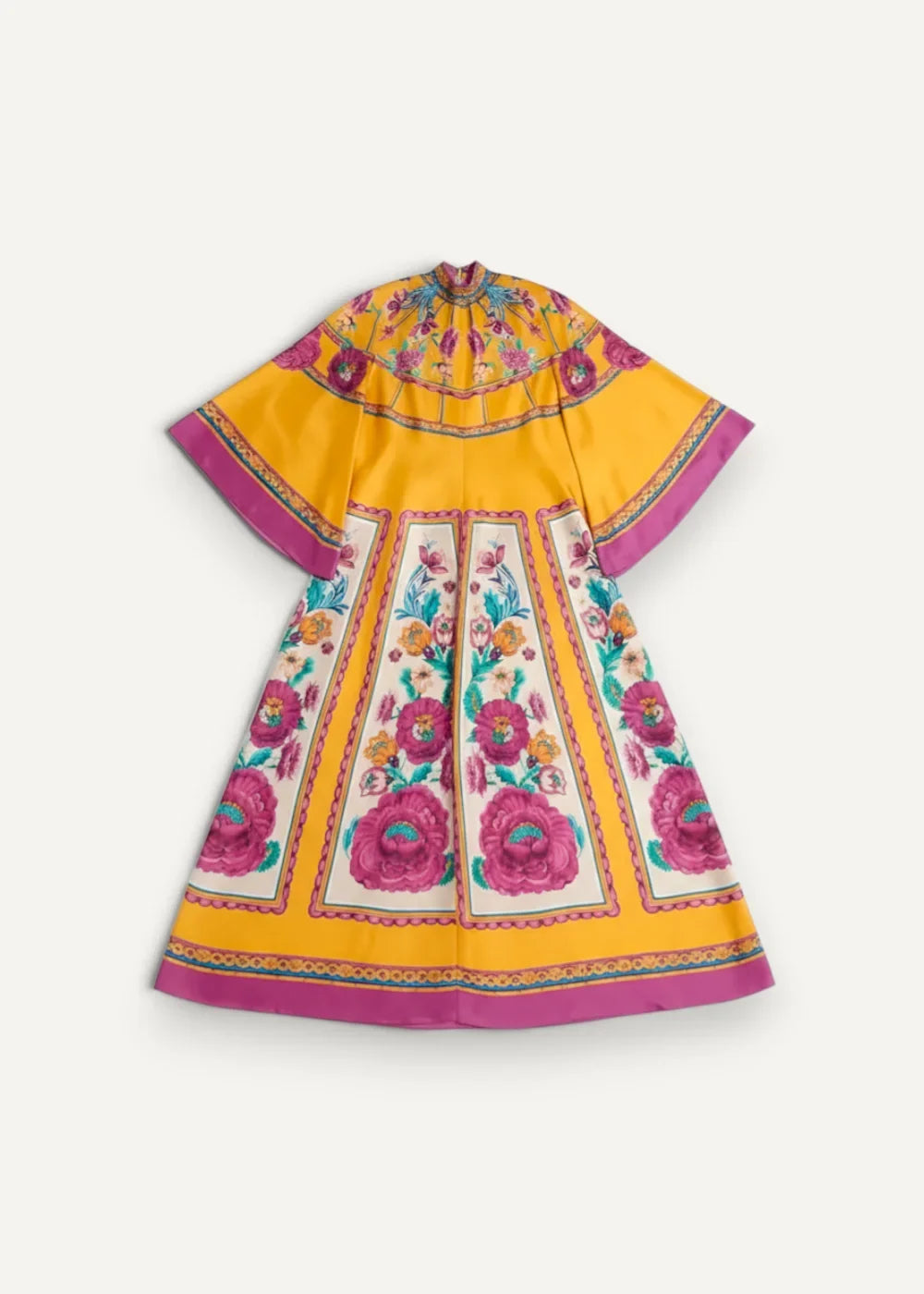 A floral kimono dress with vibrant yellow and magenta print high collar short sleeves and bold pink blossoms on off-white background