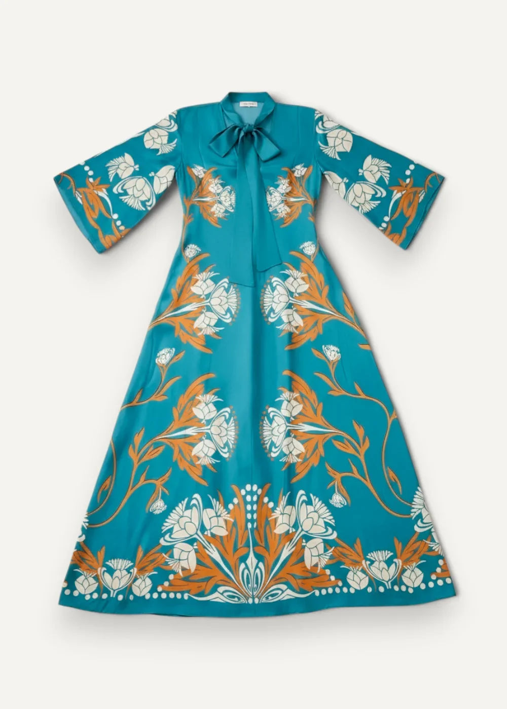 A teal floral kimono maxi dress with white and orange pattern, three-quarter sleeves, and a bow collar