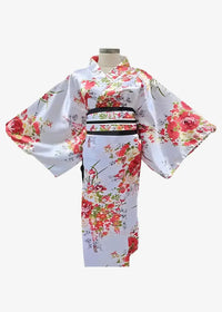 White floral kimono with vibrant red and pink patterns accented by a black obi belt in traditional style