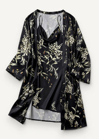 Black satin robe with white and pale green floral pattern and sheer lining in a floral nightgown and robe set