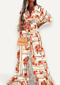 A flowing cream long-sleeved floral print kimono dress with vibrant red rose and gold chain pattern
