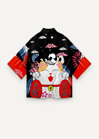 Black floral print kimono jacket with white lucky cat design red accents and colorful fish and cloud motifs