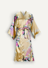 Floral satin robe in shimmering gold with vibrant pink and purple peacock and delicate floral patterns