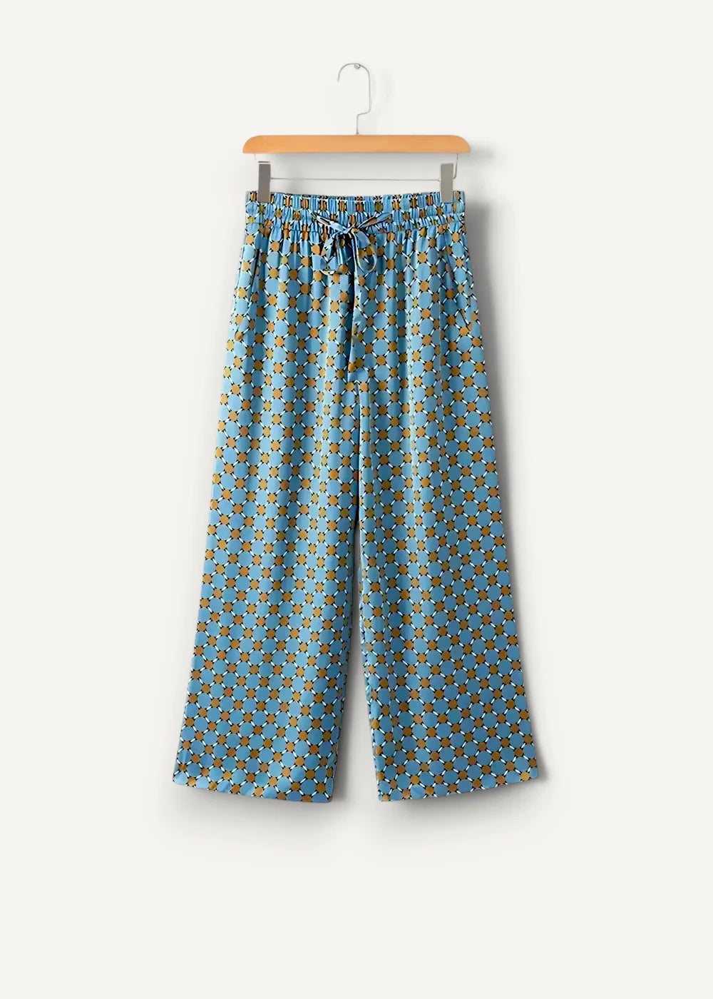 Light blue wide-leg pants with subtle earthy geometric pattern elastic waistband and drawstring from geometric kimono set